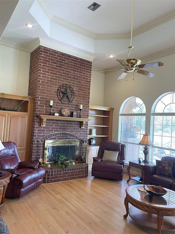 1655 Wooten Road Beaumont, TX 77707 - Photo 19 of 46 a living room with furniture and a fireplace