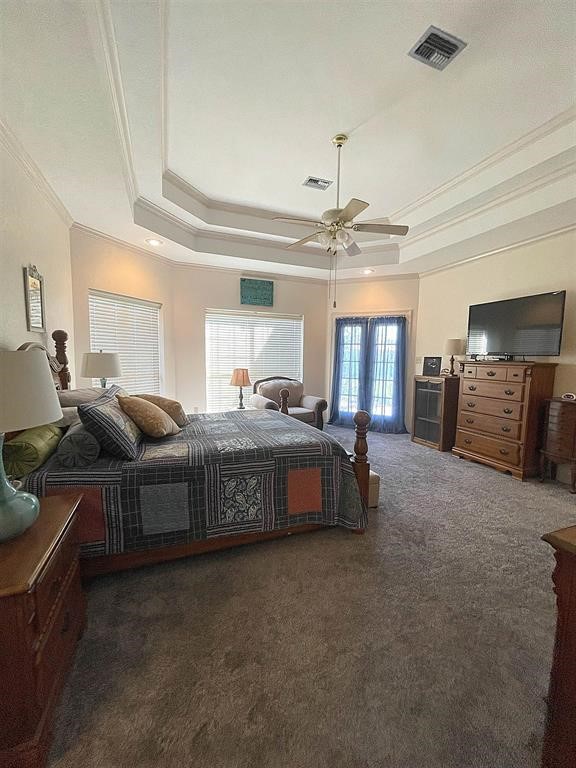 1655 Wooten Road Beaumont, TX 77707 - Photo 22 of 46 a living room with furniture and a chandelier