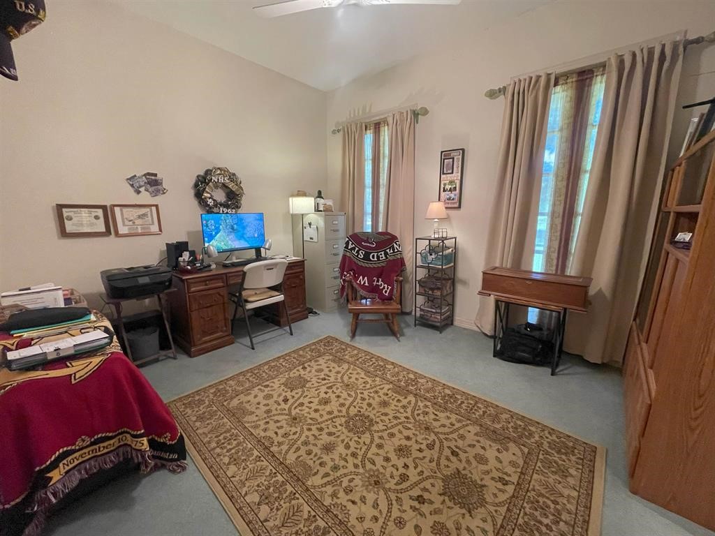 1655 Wooten Road Beaumont, TX 77707 - Photo 27 of 46 a bedroom with furniture and a window