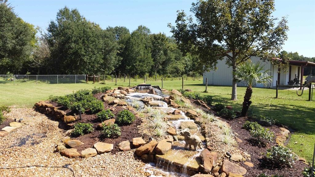 1655 Wooten Road Beaumont, TX 77707 - Photo 36 of 46 a view of a garden with an outdoor space