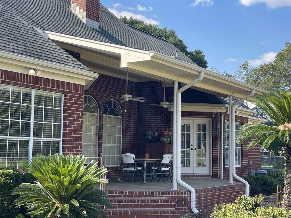 1655 Wooten Road Beaumont, TX 77707 - Photo 44 of 46 a view of a house with a patio