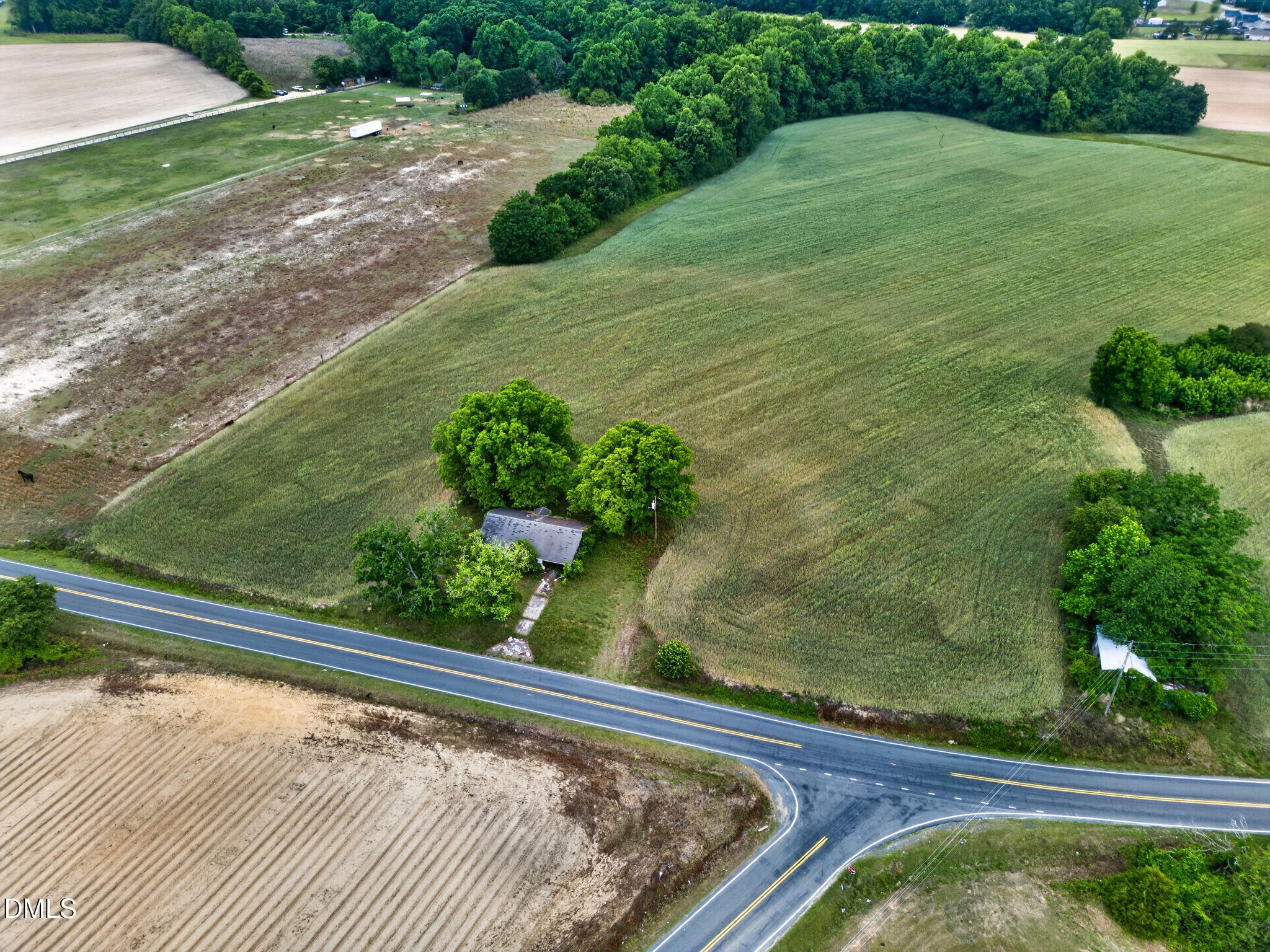 1651 Live Oak Road Angier, NC 27501 - Photo 11 of 22 a view of a pool and a yard from a window