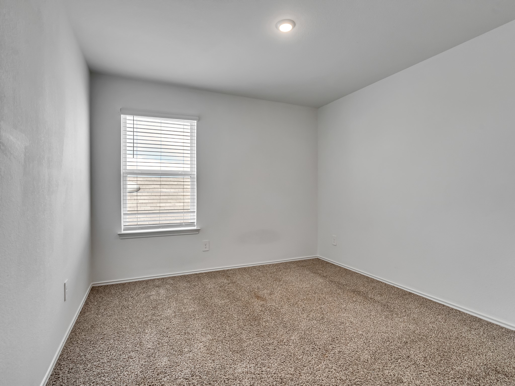 5431 Tuscany Hills Lane Spring, TX 77373 - Photo 9 of 22 an empty room with a window