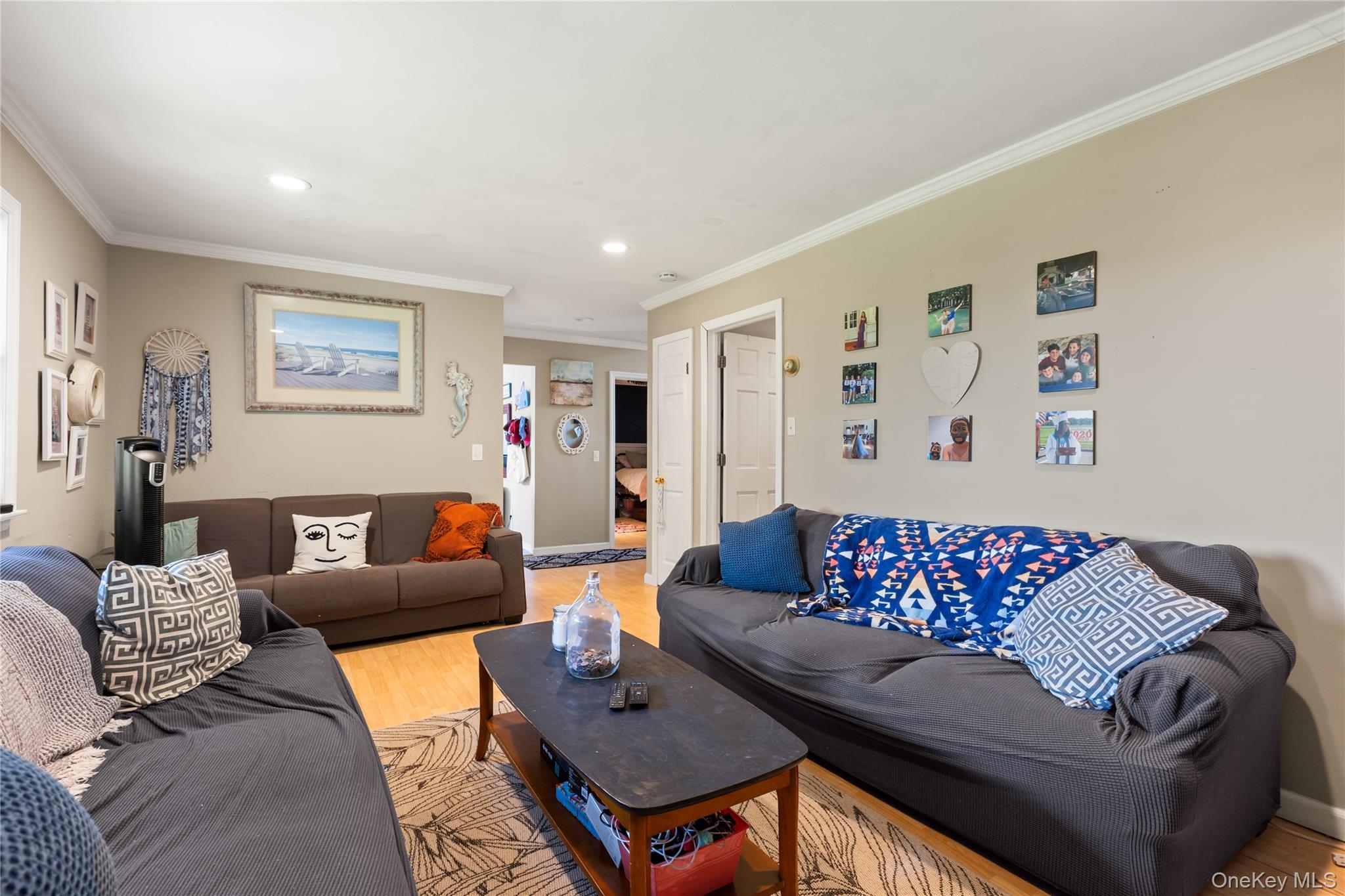 116 Cross Road Oakdale, NY 11769 - Photo 14 of 26 a living room with furniture and a couch