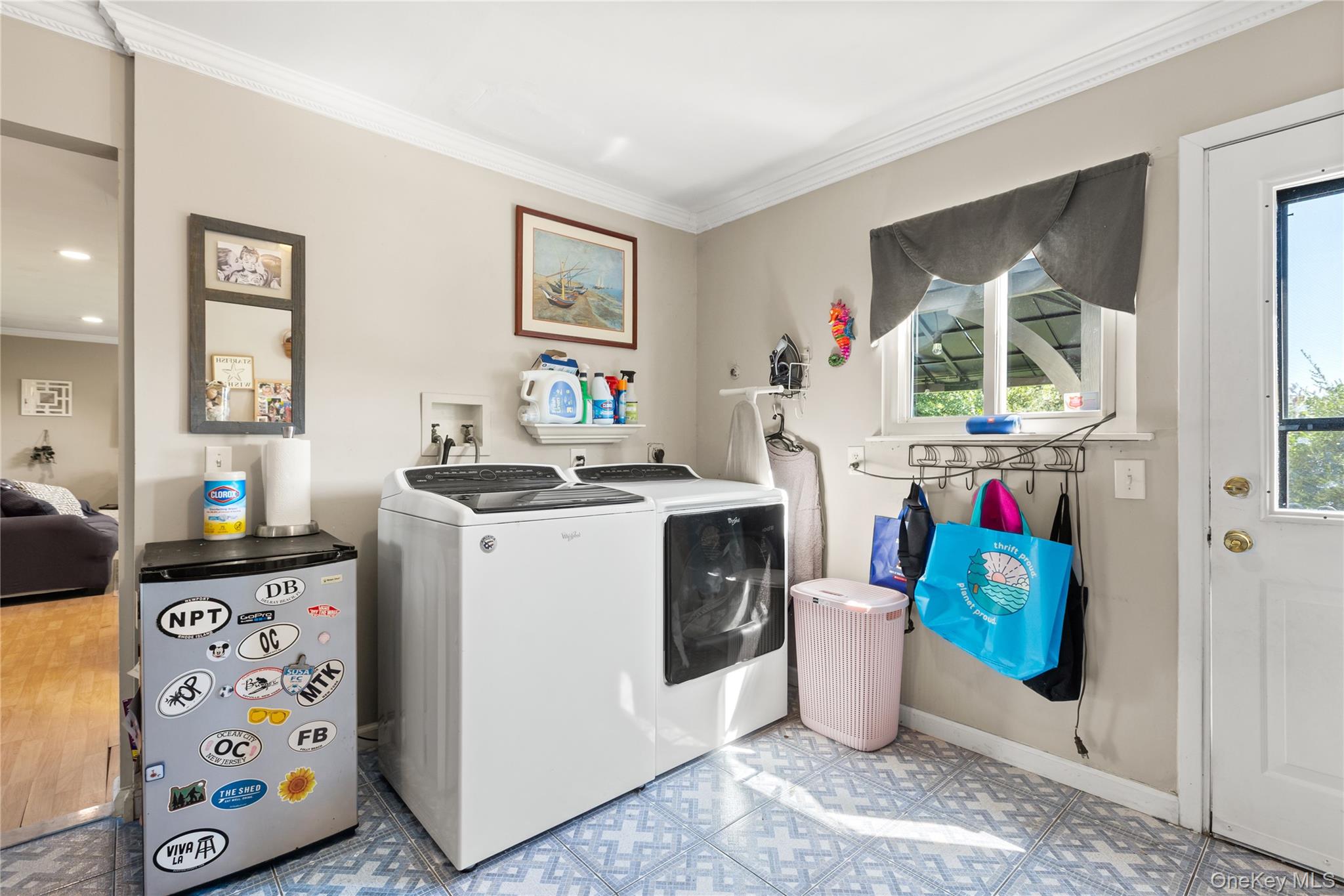 116 Cross Road Oakdale, NY 11769 - Photo 17 of 26 a kitchen with a stove a sink and a refrigerator