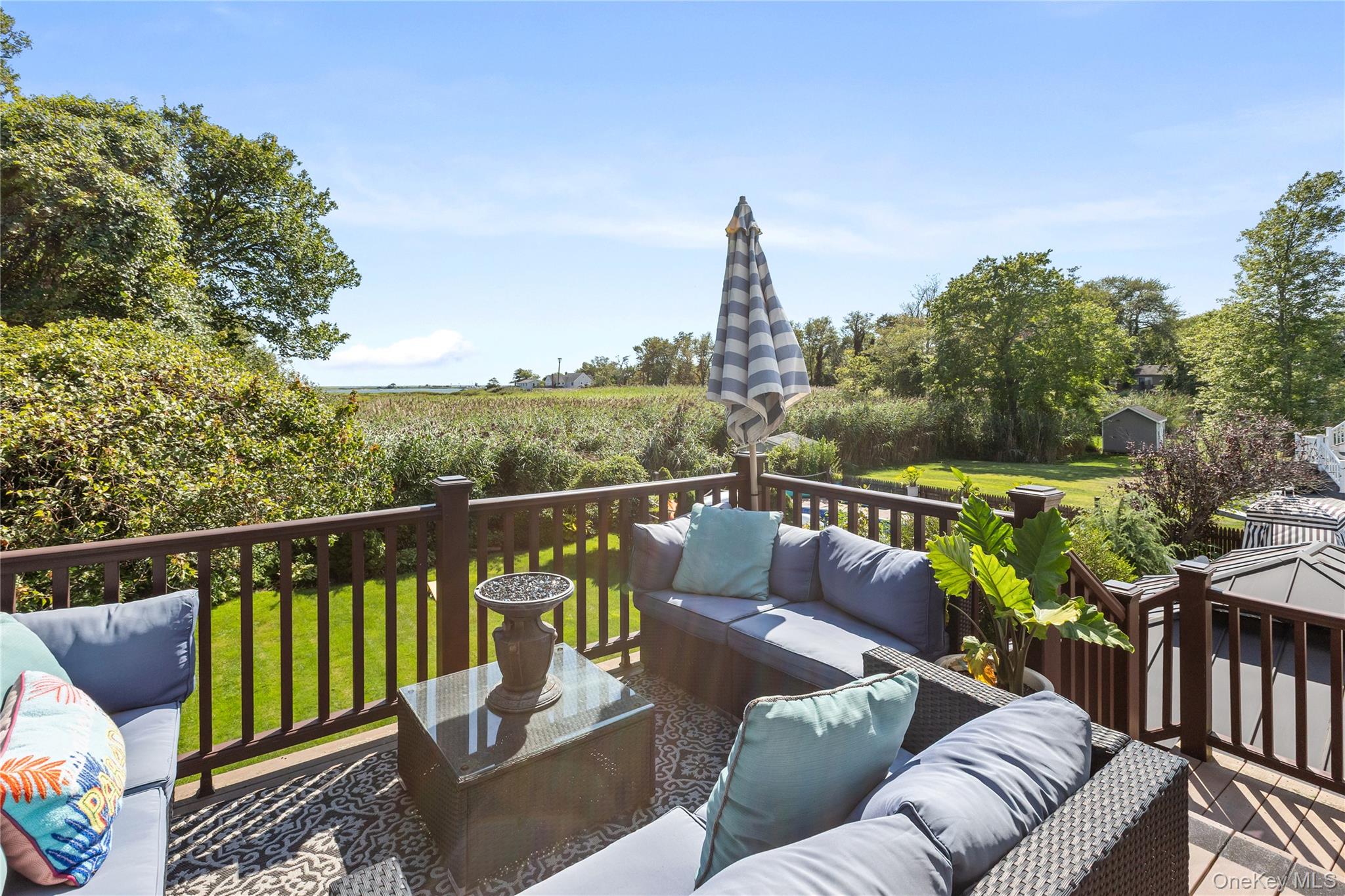 116 Cross Road Oakdale, NY 11769 - Photo 18 of 26 a view of a two chairs in the deck
