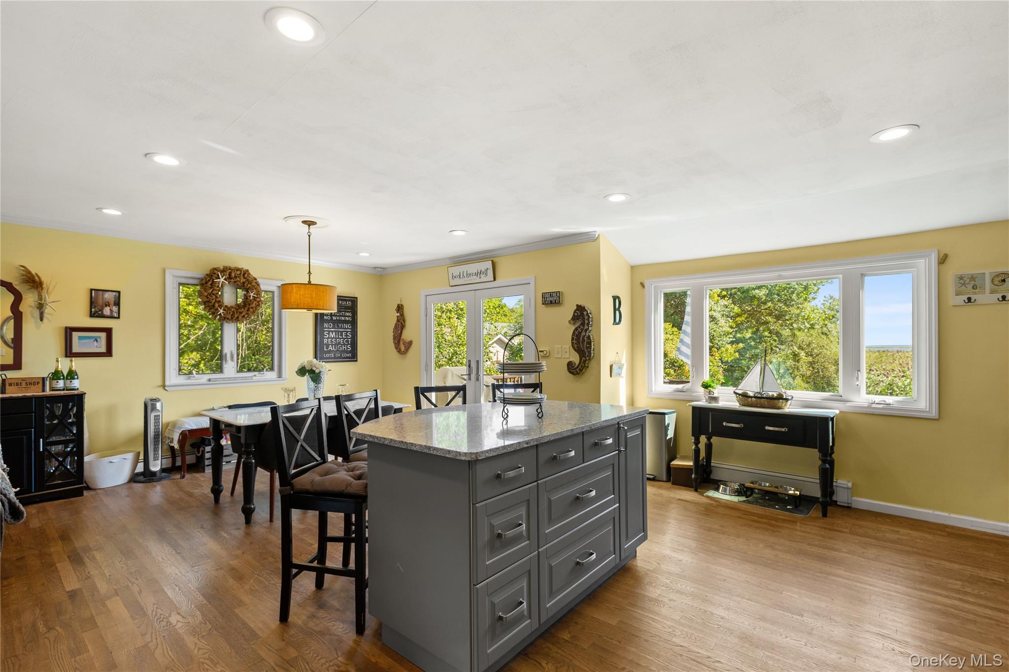 116 Cross Road Oakdale, NY 11769 - Photo 2 of 26 a view of a dining room with furniture window and outside view