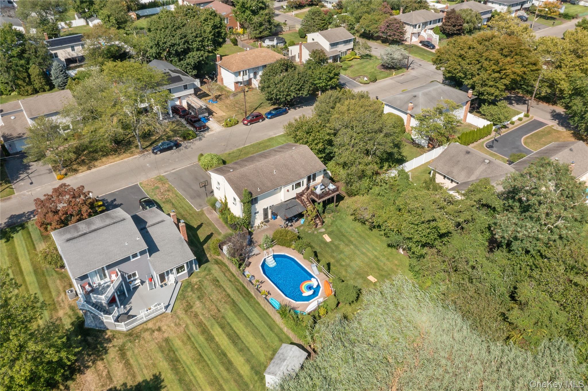 116 Cross Road Oakdale, NY 11769 - Photo 21 of 26 an aerial view of residential house with outdoor space and swimming pool