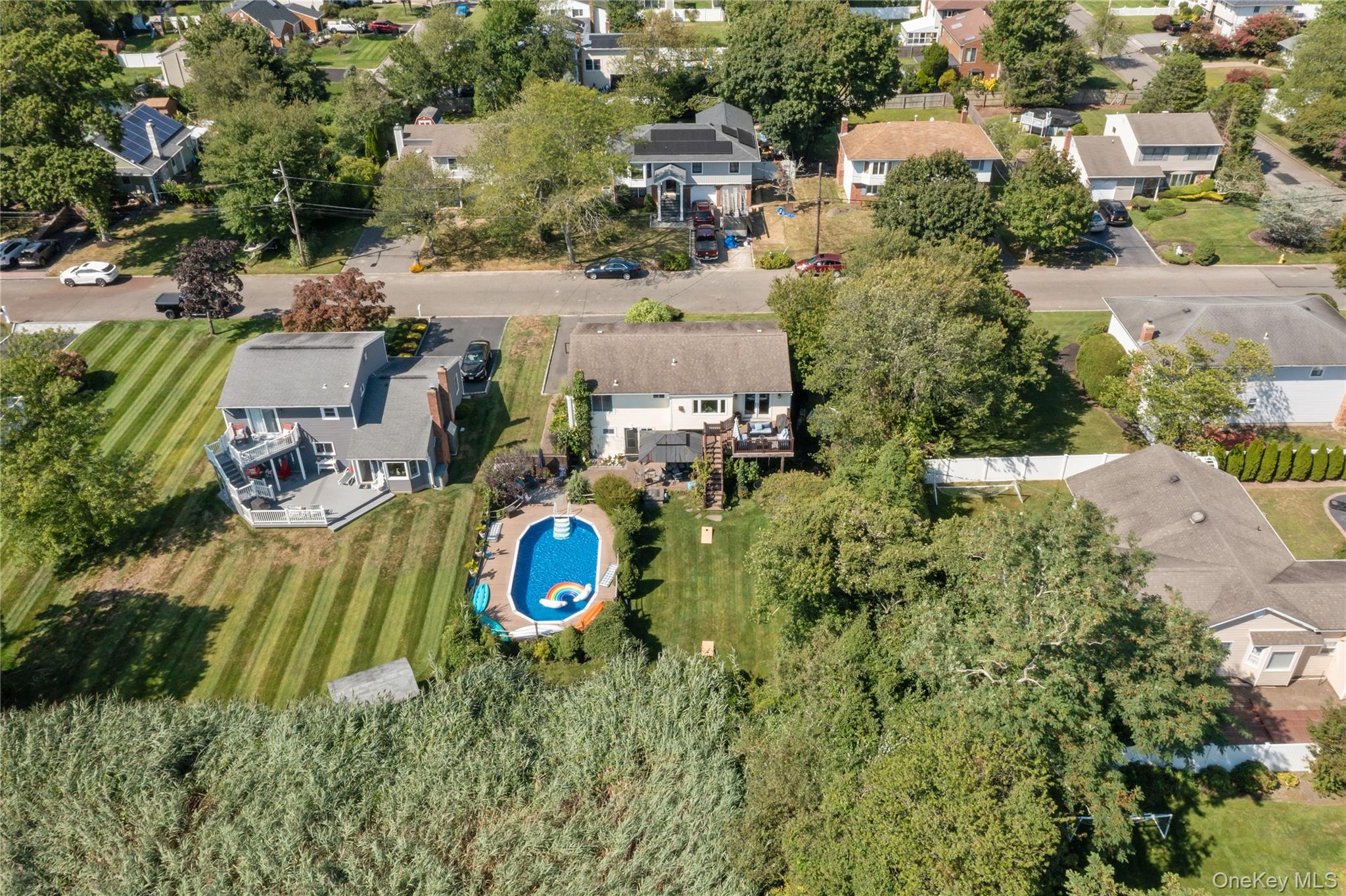 116 Cross Road Oakdale, NY 11769 - Photo 22 of 26 an aerial view of a house with outdoor space and street view