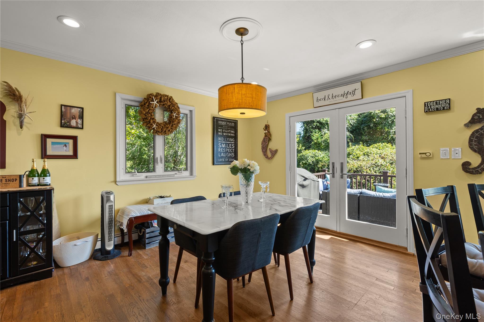 116 Cross Road Oakdale, NY 11769 - Photo 6 of 26 a dining room with furniture and window