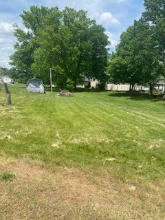 4309 Joe Peay Cemetery Road Spring Hill, TN 37174 - Photo 3 of 8 a view of outdoor space with deck and yard