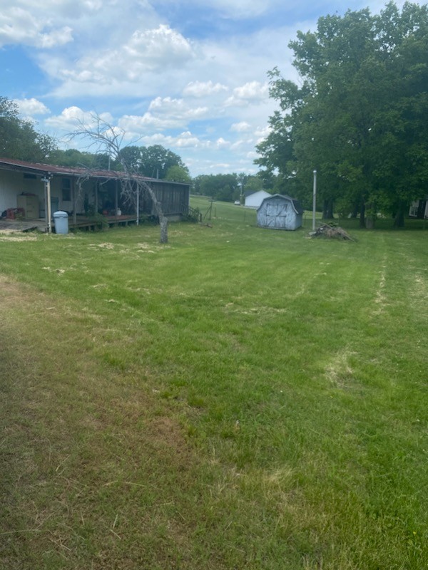 4309 Joe Peay Cemetery Road Spring Hill, TN 37174 - Photo 5 of 8 a view of a house with a yard