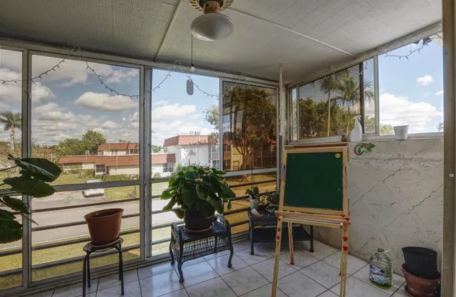 a room with furniture and a window