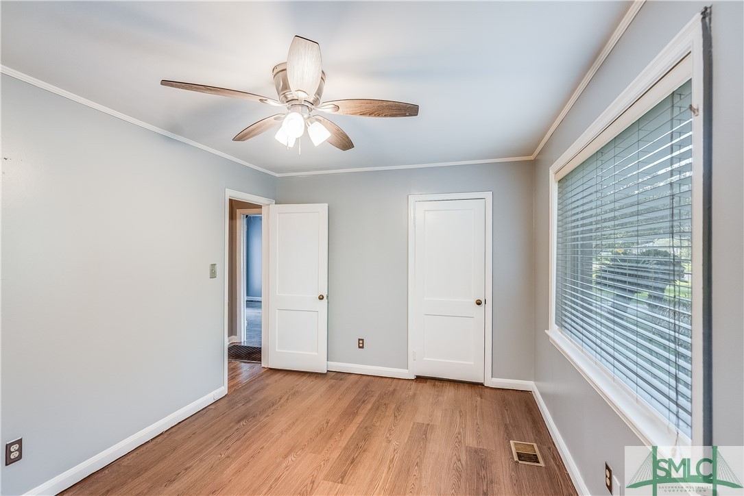 211 Brandywine Road Savannah, GA 31405 - Photo 15 of 23 Refreshing lighted ceiling fan, fresh paint, and t