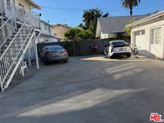 a car parked in front of a house