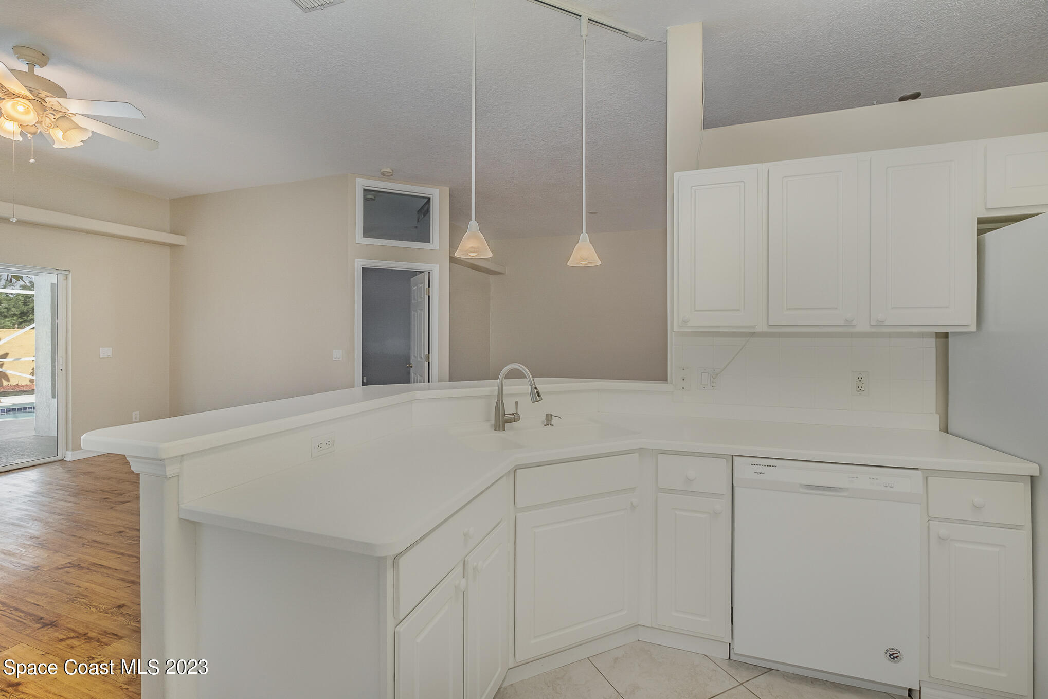 3910 La Flor Drive Rockledge, FL 32955 - Photo 11 of 24 a bathroom with a sink and mirror