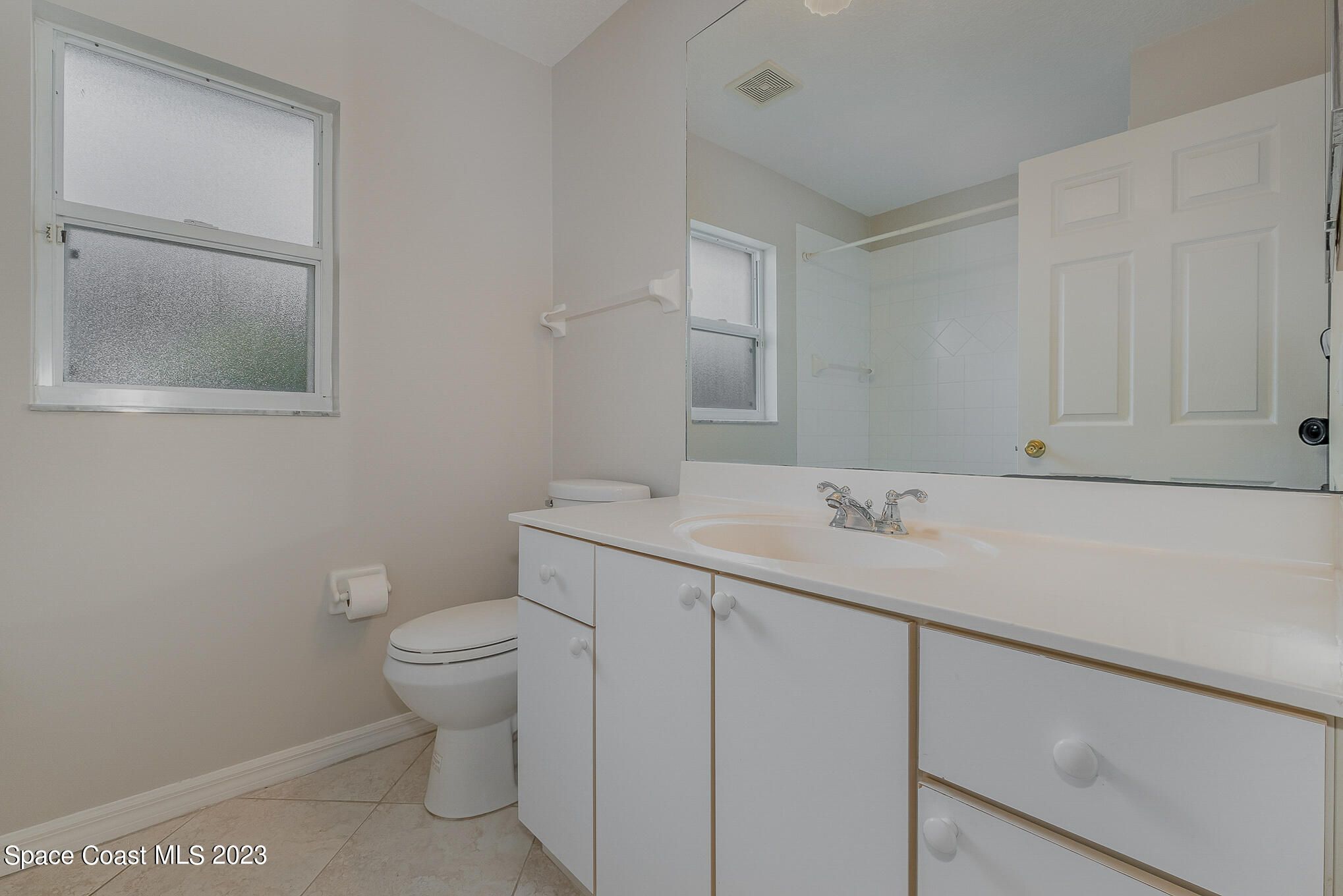 3910 La Flor Drive Rockledge, FL 32955 - Photo 19 of 24 a bathroom with a sink and a toilet