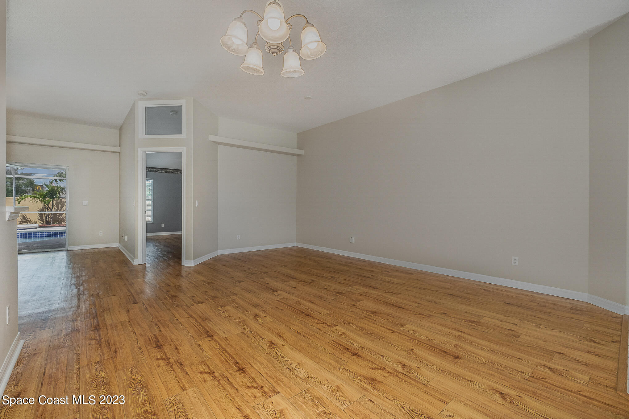 3910 La Flor Drive Rockledge, FL 32955 - Photo 5 of 24 a view of empty room with wooden floor