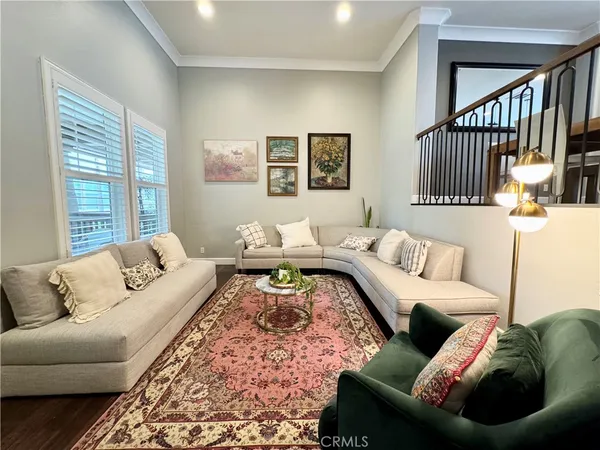 a living room with furniture and a couch