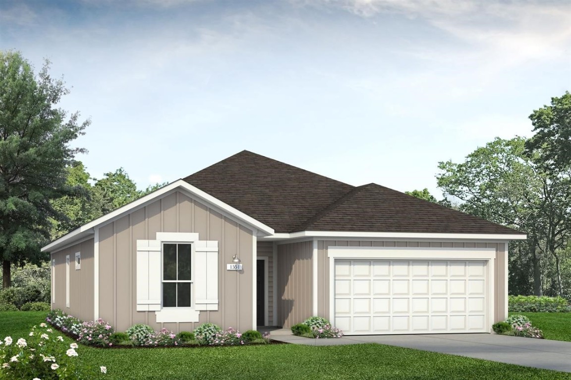 11600 Comano Drive Austin, TX 78747 - Photo 1 of 1 a front view of a house with a yard and garage