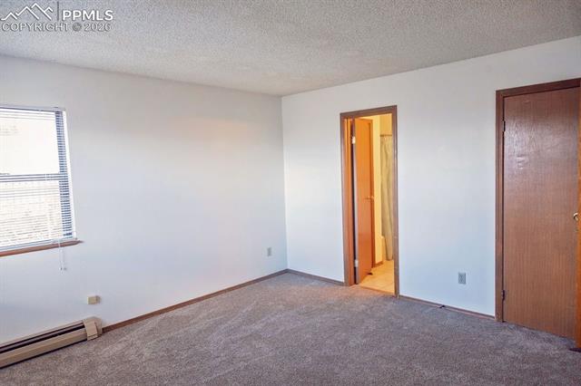 20 Sommerlyn Road Colorado Springs, CO 80906 - Photo 45 of 50 21 El Sereno Dr: Primary Bedroom Suite
