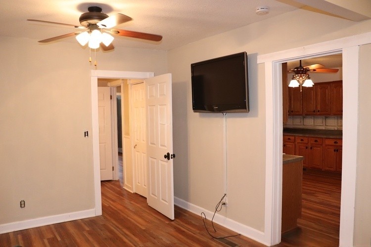 209 Church Street Dover, TN 37058 - Photo 7 of 16 a view of a livingroom with a flat screen tv