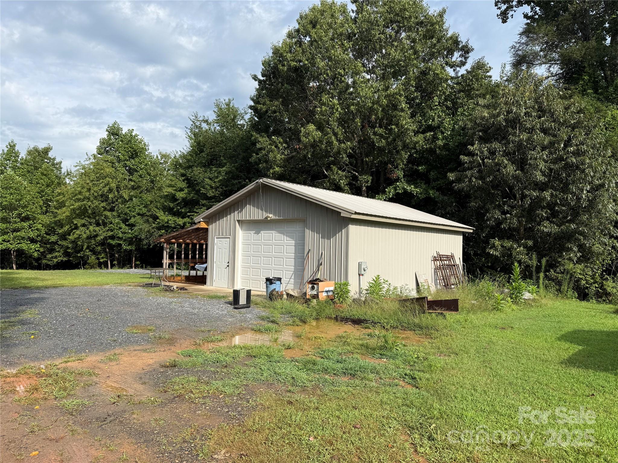 637 Ridge Road Marion, NC 28752 - Photo 1 of 18 a view of a yard with large trees