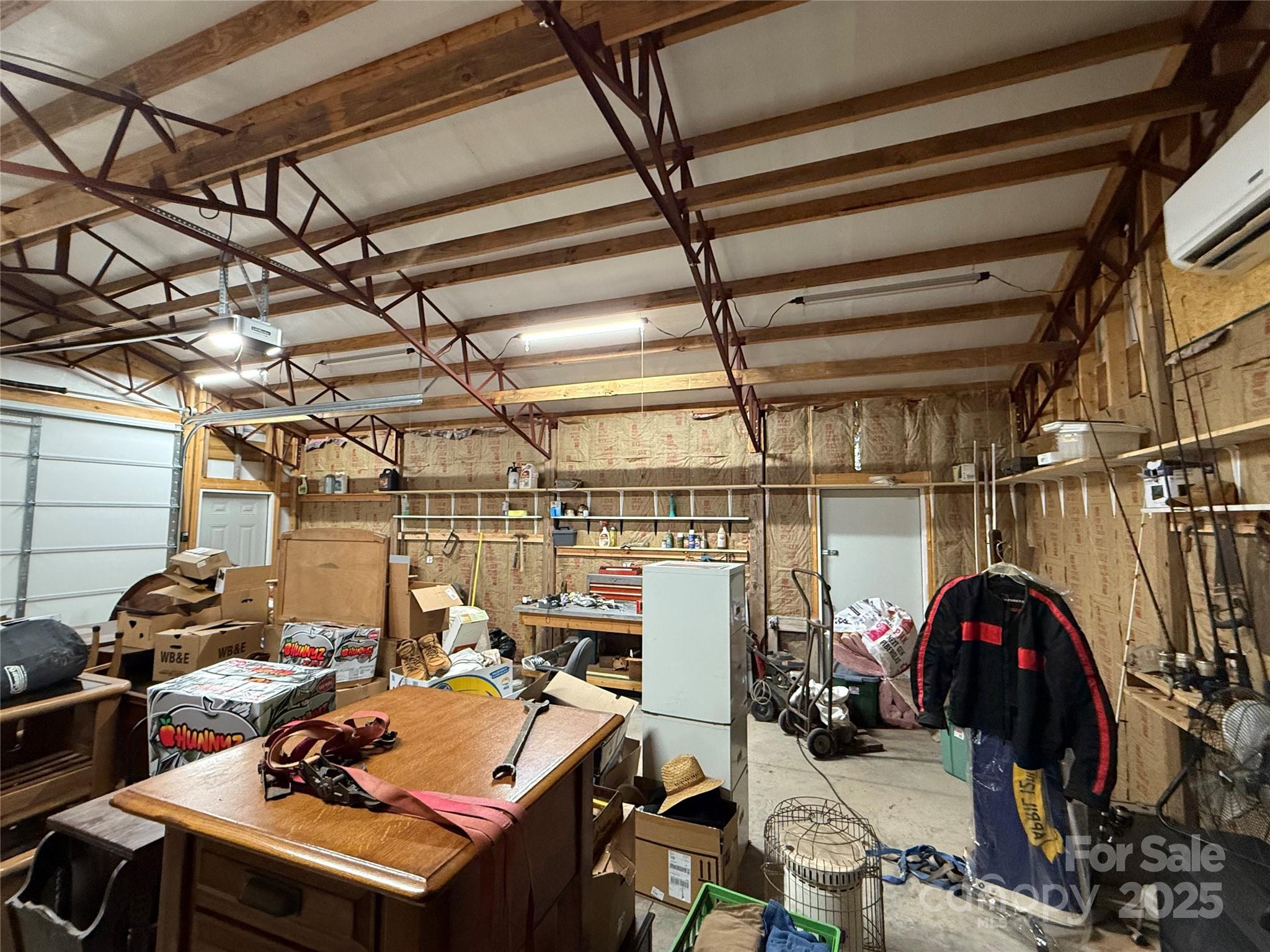 637 Ridge Road Marion, NC 28752 - Photo 7 of 18 a view of a storage room with washer and dryer
