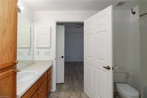a bathroom with a sink and toilet
