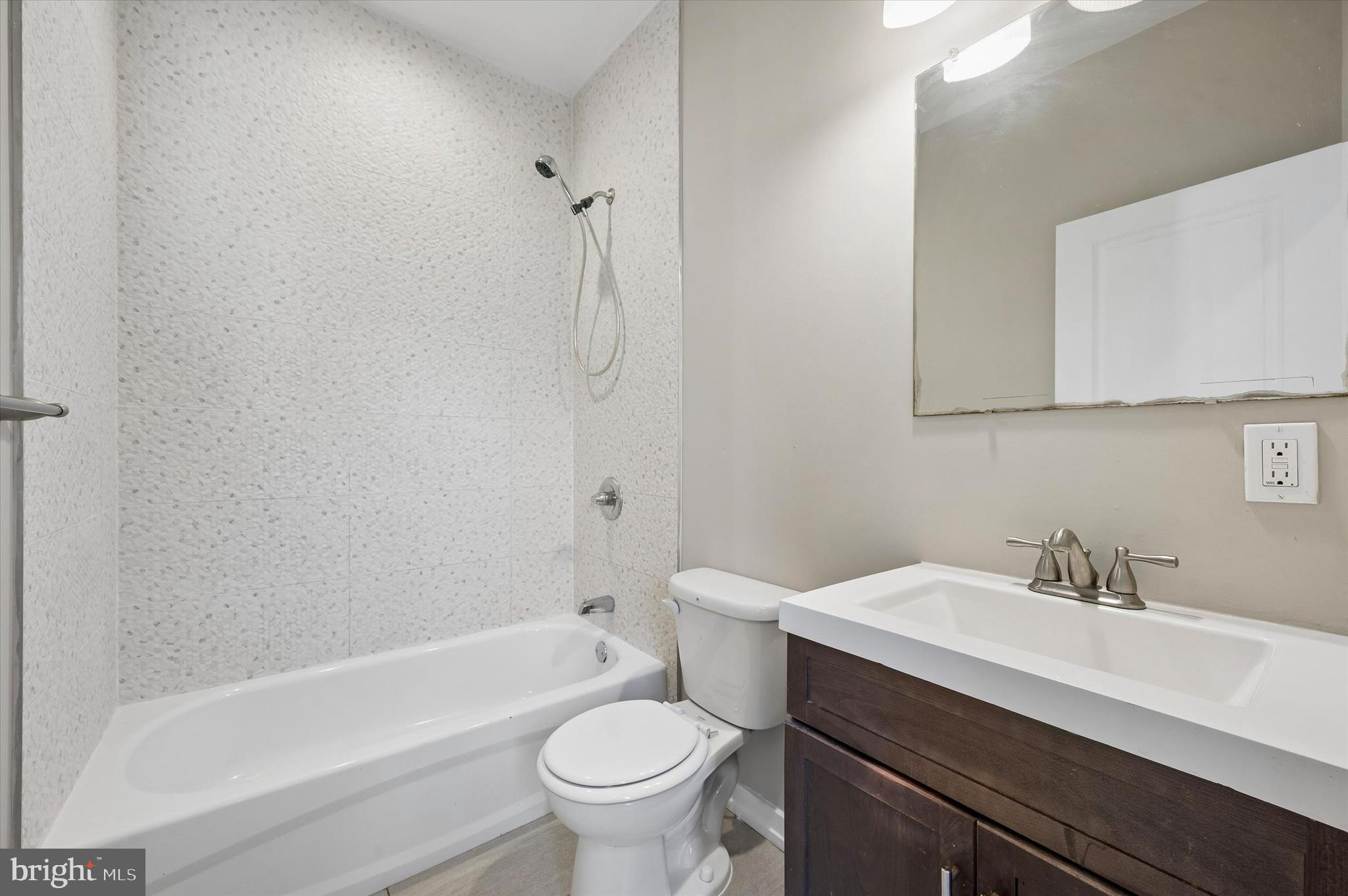 617 South 2nd Street, Unit 3R Philadelphia, PA 19147 - Photo 15 of 19 a bathroom with a sink toilet and bathtub