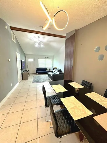 a view of a dining room with furniture