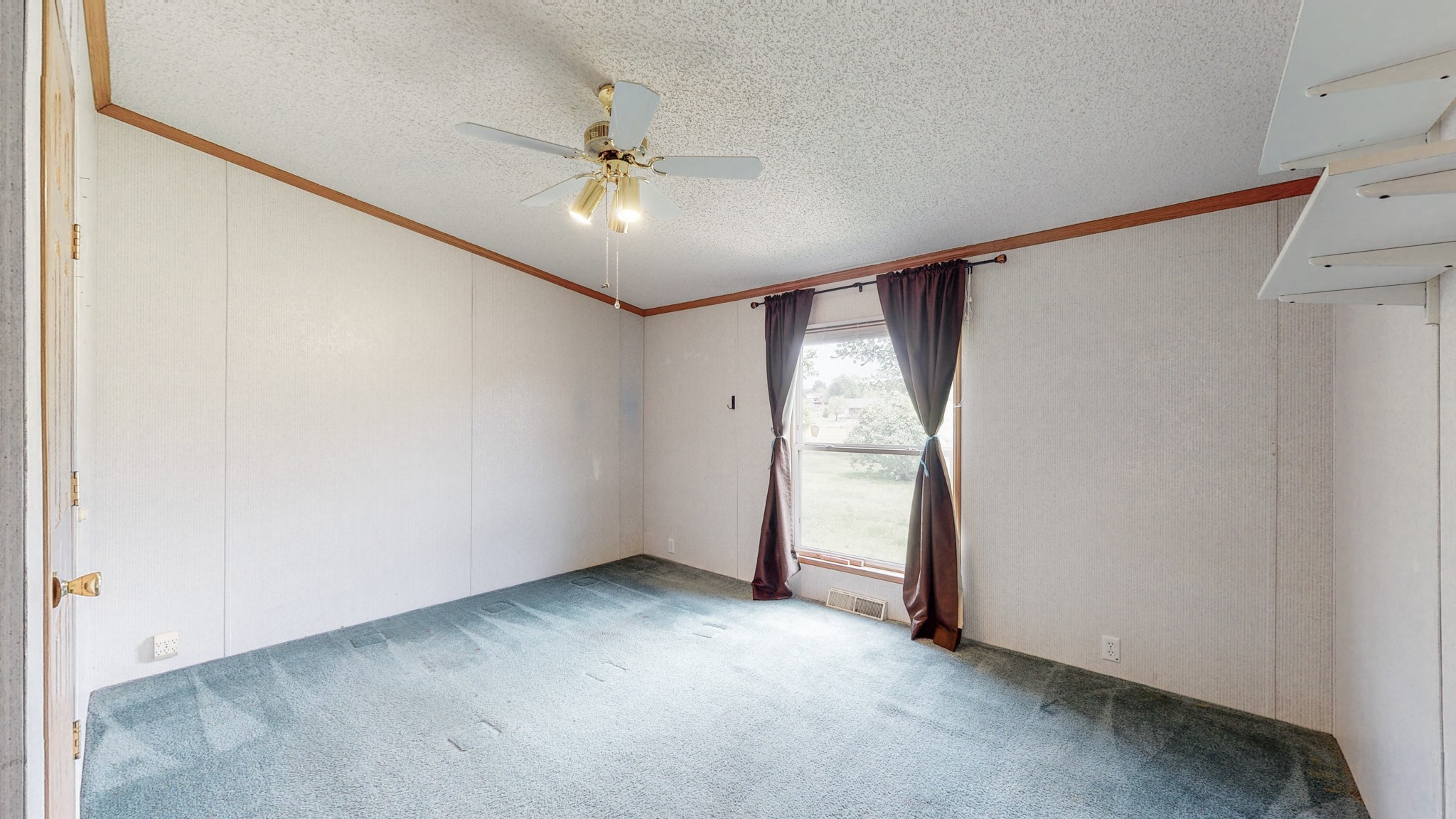 154 Blue Well Road Lebanon, TN 37090 - Photo 7 of 25 a view of an empty room with a window