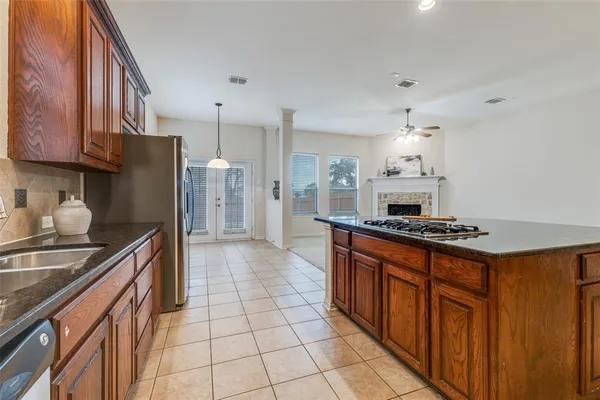 a view of a pathway both side of a house