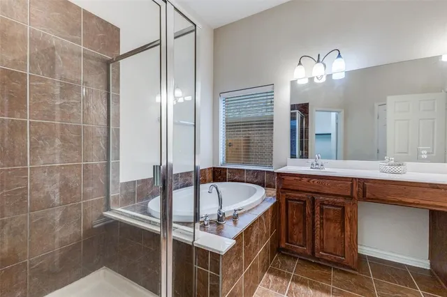 a bathroom with a double vanity sink mirror and double
