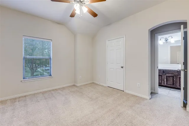 a bathroom with a sink toilet a mirror and shower