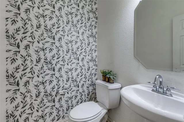 an empty room with a bathroom