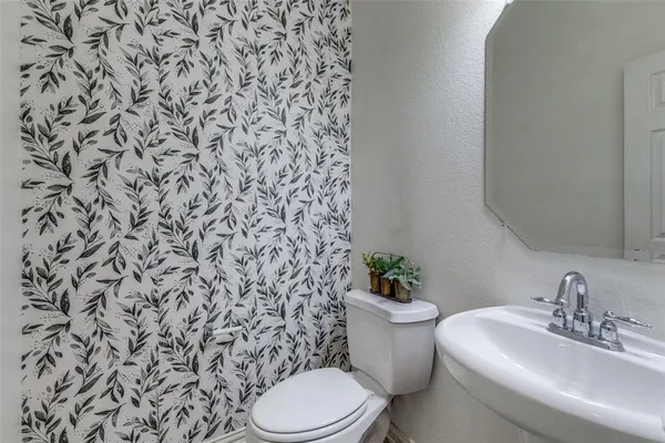 an empty room with a bathroom