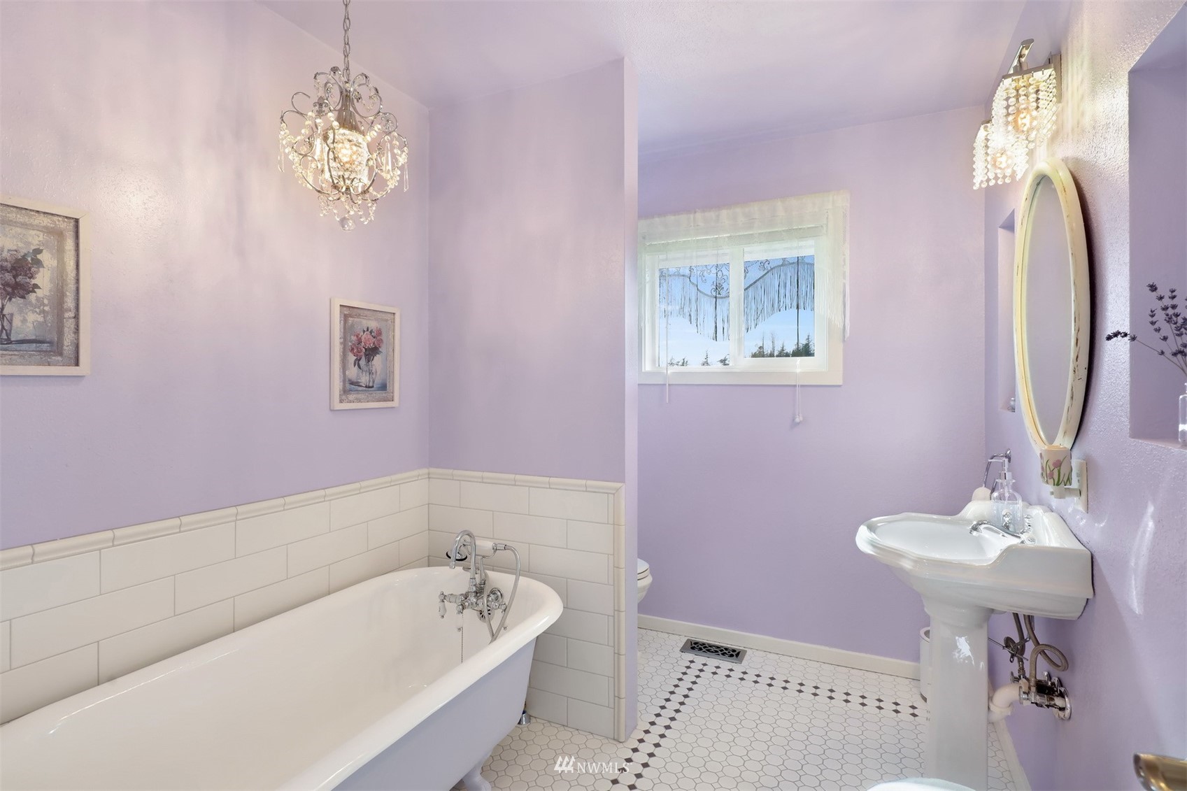 5397 Olson Road Ferndale, WA 98248 - Photo 16 of 40 a bathroom with a sink a mirror and a bathtub