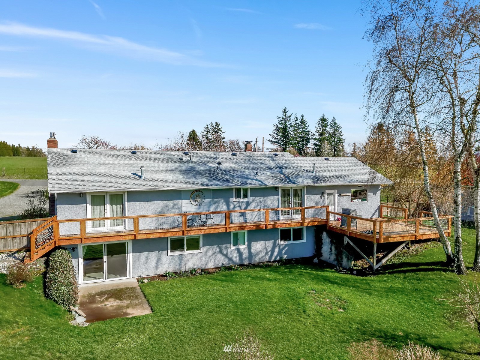 5397 Olson Road Ferndale, WA 98248 - Photo 2 of 40 an outdoor sitting area in front of house