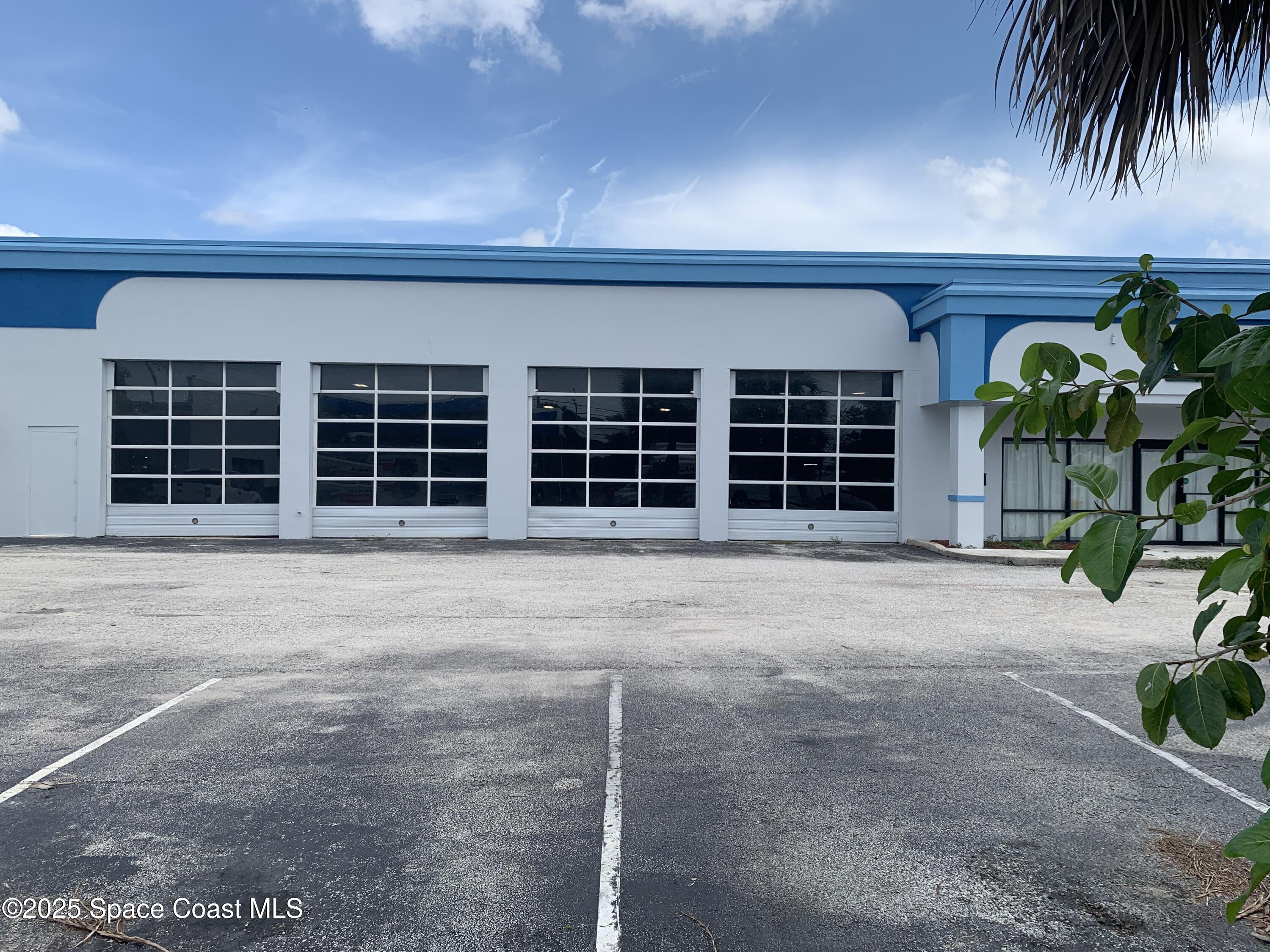1296 Sarno Road Melbourne, FL 32935 - Photo 3 of 5 Front Building view