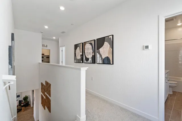 a hallway with cabinets