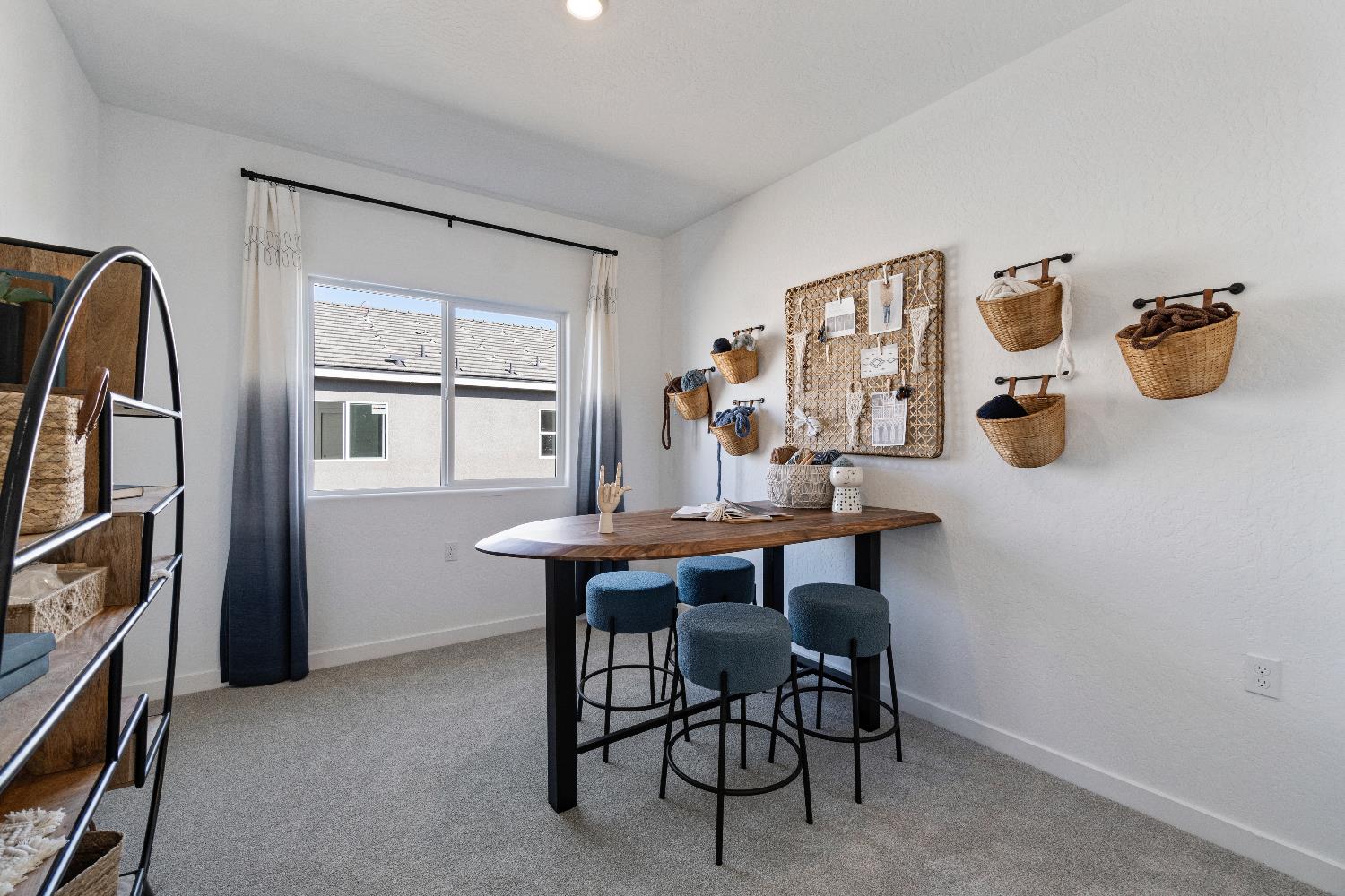 1059 Springtime Avenue Clovis, CA 93619 - Photo 24 of 32 a view of a dining room with furniture and chandelier