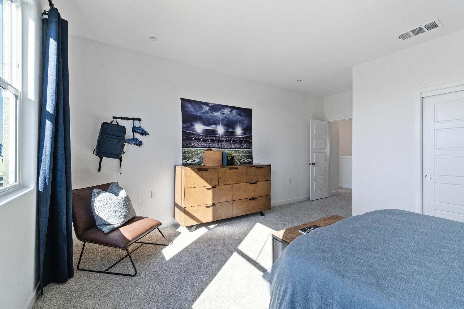 1059 Springtime Avenue Clovis, CA 93619 - Photo 29 of 32 a bedroom with furniture and a window