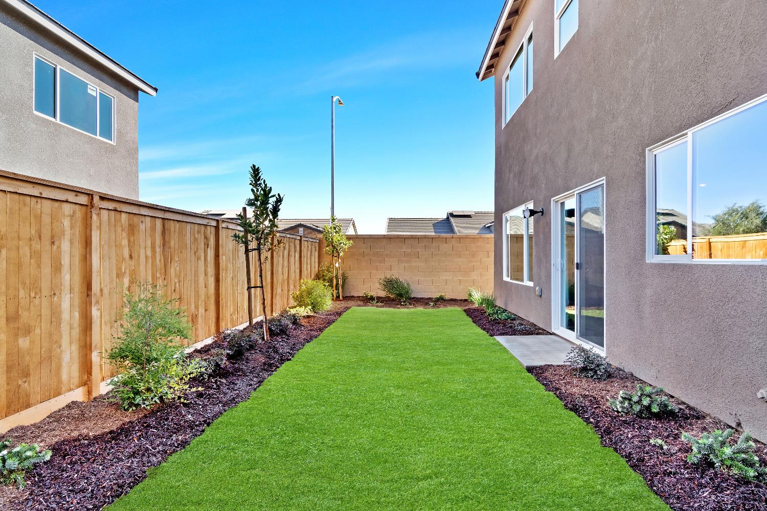 1059 Springtime Avenue Clovis, CA 93619 - Photo 32 of 32 a view of a back yard of the house