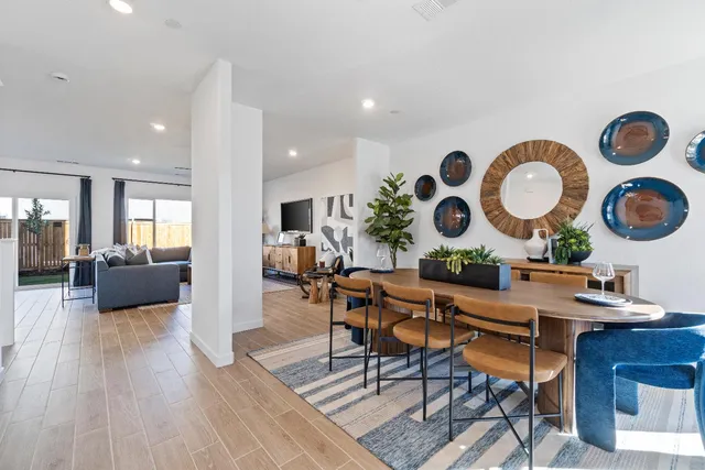 a living room with furniture and rug