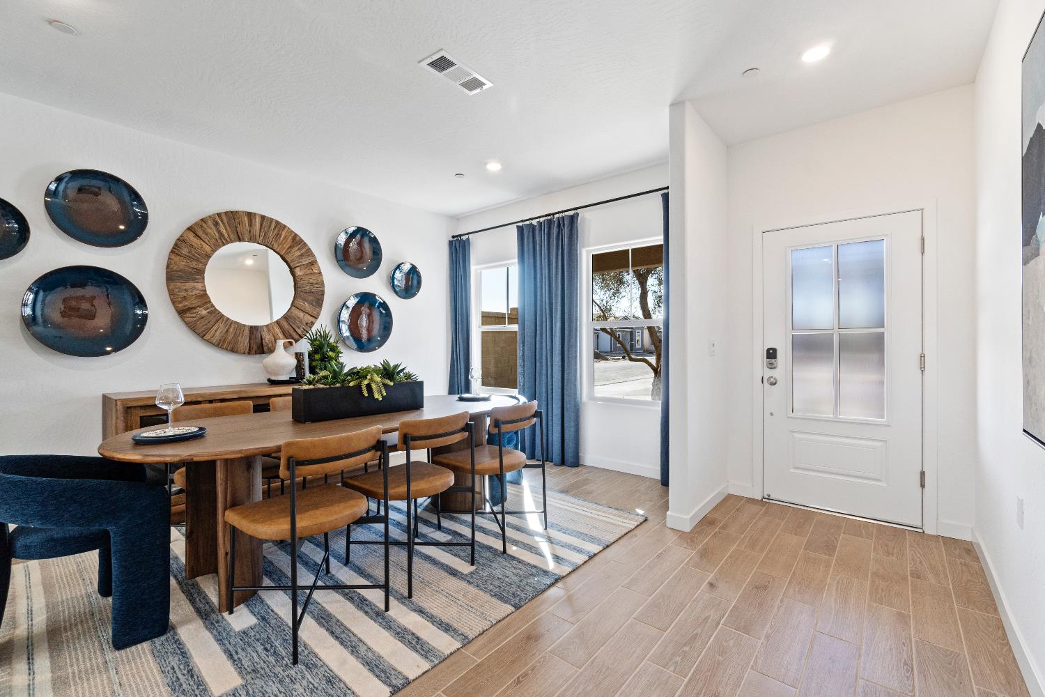 1059 Springtime Avenue Clovis, CA 93619 - Photo 5 of 32 a view of a kitchen area with furniture and wooden floor