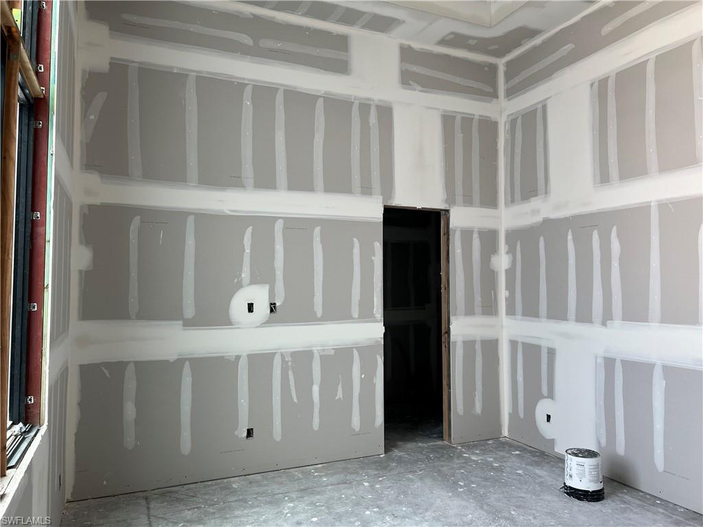 944 Chimney Rock Road Naples, FL 34120 - Photo 13 of 15 a room with a cabinet