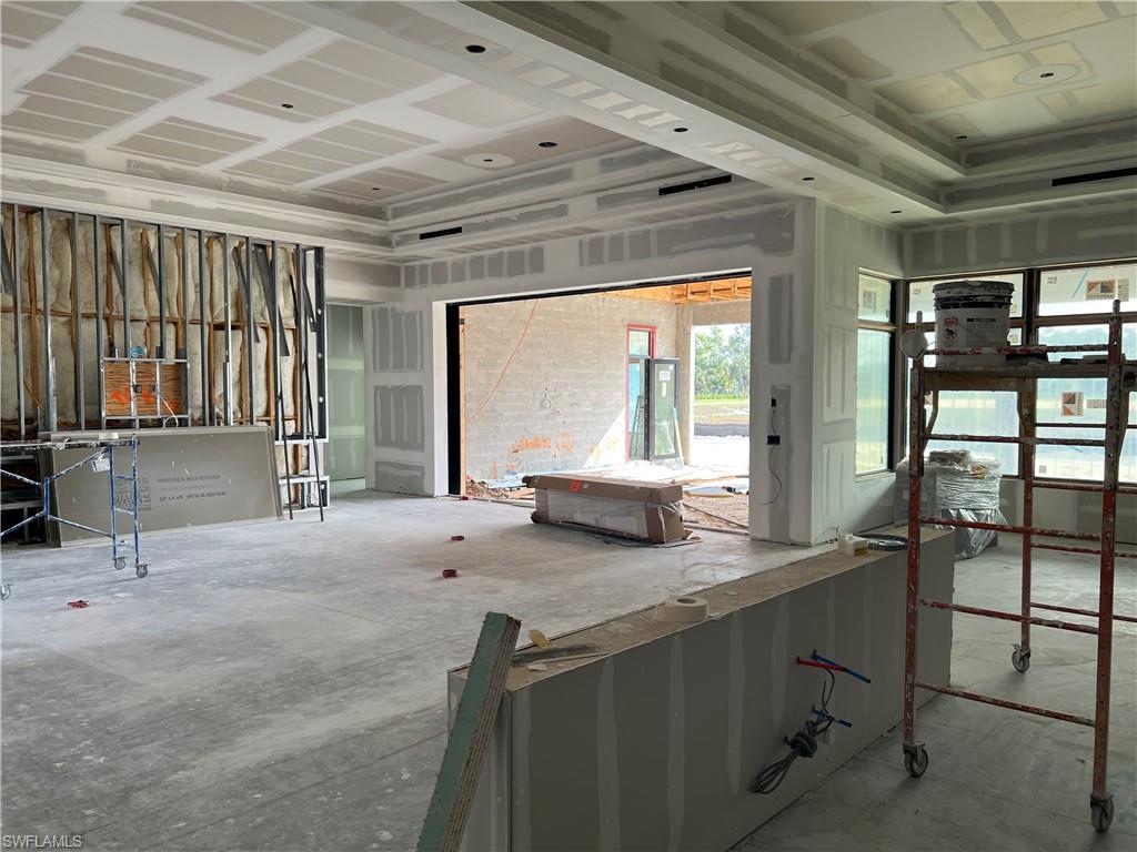 944 Chimney Rock Road Naples, FL 34120 - Photo 6 of 15 a kitchen with sink and window