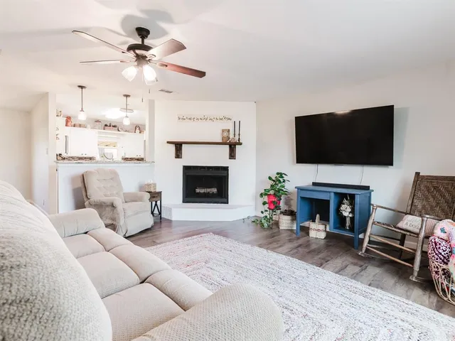 a kitchen with a refrigerator and a sink