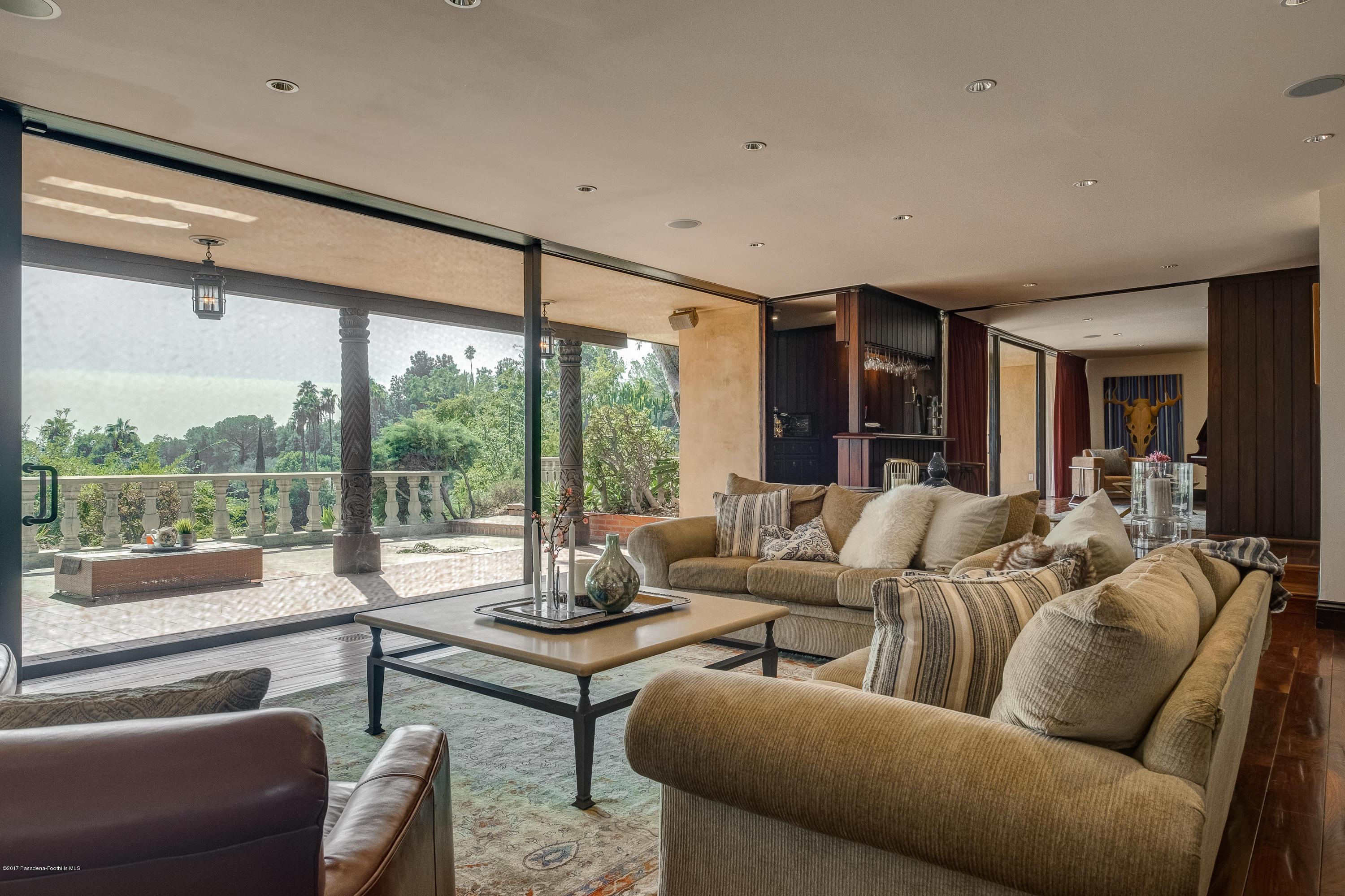 320 Patrician Way Pasadena, CA 91105 - Photo 11 of 69 a living room with furniture and a large window